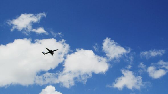 Airplane Soar Through Sky